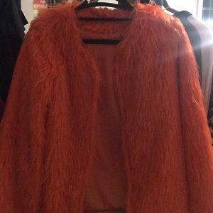 Bright orange fur coat